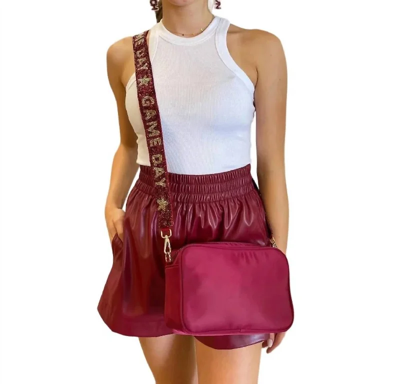 Modern Romance Faux Leather Shorts In Maroon